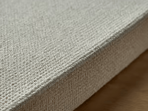 a close up of a white and beige rug with a white rug