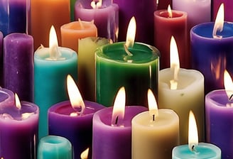 lighted candles on black surface