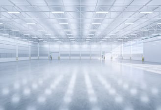 An empty warehouse with LED lighting