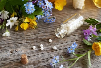 bottle of homeopathic pills in Surrey clinic