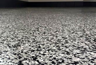 black and white and grey epoxy flake flooring