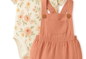a baby girl's outfit with a pink romper