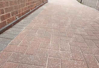 After photo of a professionally jetwashed block paving driveway in Hull, showing restored colour and