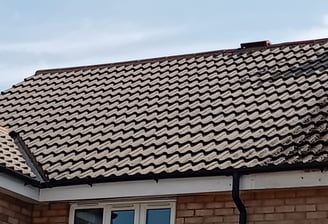 Before and after results of a house roof professionally cleaned by Venom Property Maintenance in Hul