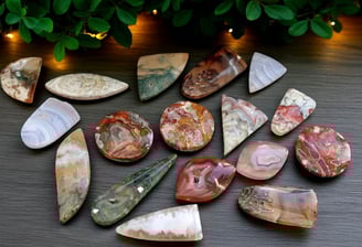 A selection of agate stone cabochons in various cuts with a bright polish 