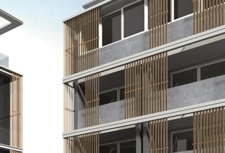 Edificio multifamiliar con balcones amplios y fachada ventilada con revestimiento de madera clara