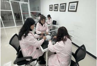 a group of people in lab duct feather