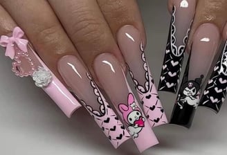 a woman's hand painted nails and nails on her nails