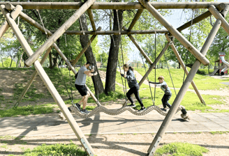 family playing at park
