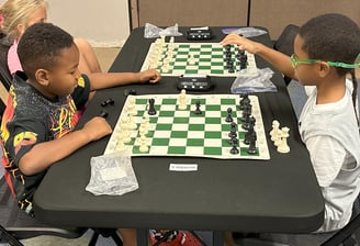 Children playing chess at a practice chess tournament at the Henderson Multi-Gen Rec Center in NV