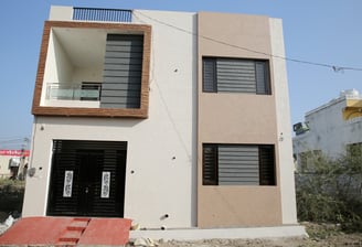 a house with a large window and a door