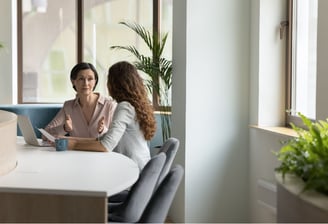 two-women-having-a-face-to-face-meeting