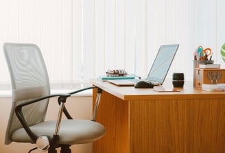 office desk with laptop