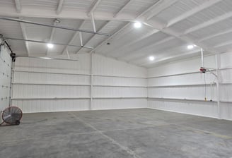 open cell spray foam insulation inside a barn in lakewood, colorado