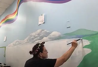 marcine painting bespoke mural at summit speech school new providence nj