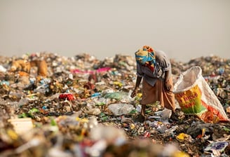 garbage collected picking plastic trash from a hazardous dumpsite in kenya