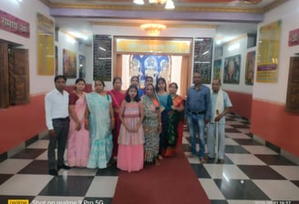 Family group photo in Katghora temple