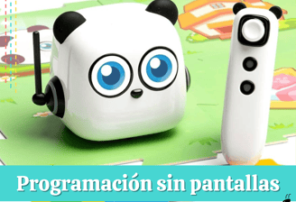 Robot educativo con control remoto sobre tablero infantil, usado en programación sin pantallas.