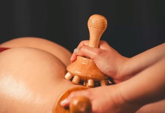 a woman getting a massage at a spa