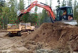 Excavator and track dumper doing bulk excavation. Vernon, BC