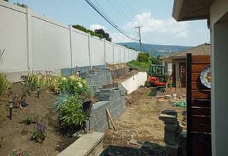 Retaining wall and landscaping using excavator, okanagan