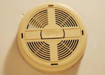 and old discolored smoke detector