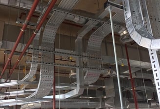 a large metal pipework in a building, electrical