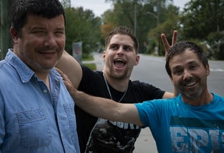 a group of men standing outside jericho road ministries