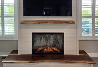 Custom live-edge wood fireplace mantel and hearth with electric fireplace – modern shiplap wall