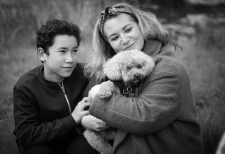 Family enjoying a relaxed outdoor photoshoot in Essex