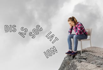 A confused woman sitting in a chair on a mountain top