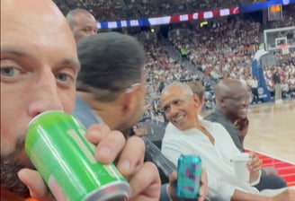 Ray Jarosz courtside with Barack Obama at the Team USA basketball showcase game in Las Vegas, Nevada