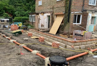 Groundwork contractor preparing site for construction