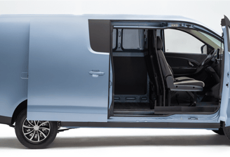 a blue van with a seat and a driver's seat