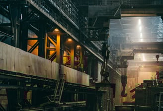 a factory with a large amount of steel and a lot of machinery