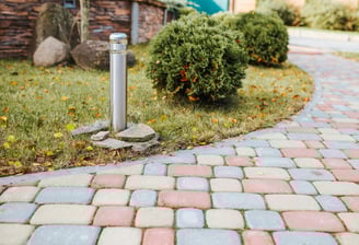 A walkway made of stone pavers