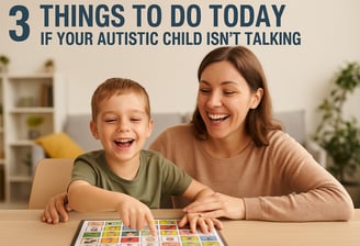 mom and her young son sitting at a table happy and smiling pointing to a visual communication board