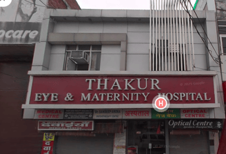 An image showing the facade of Thakur Eye and Maternity Hospital