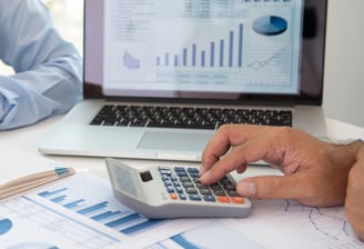 a man is using a calculator calculator