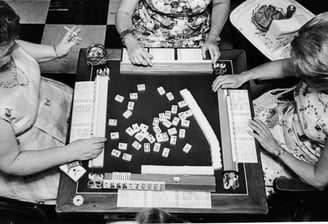 Group of women playing mahjong