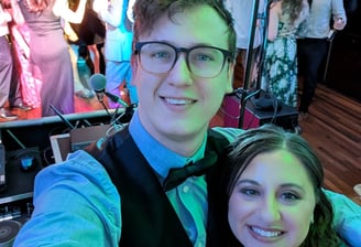 wedding DJ selfie with packed dance floor