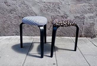 a pair of stools with a leopard print on them