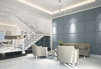a living room with a staircase and a staircase