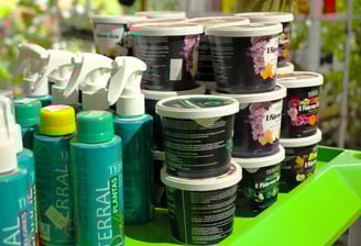 a bunch of different types of paint and decor items