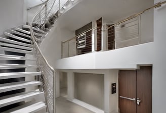 a group of bottles of essential oils next to a plant