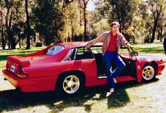 Peter Pickering at Perry Lakes in Perth, having restored his red Jaguar XJS V12