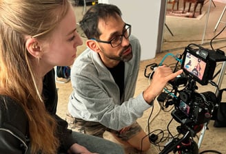 Young woman working with documentary filmmaker