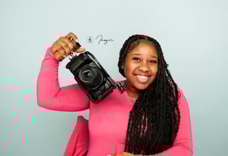 A Female Holding a camera