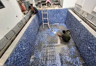 proses pengenatan kolam renang