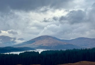 Beautiful peaceful moody scene of hills and river